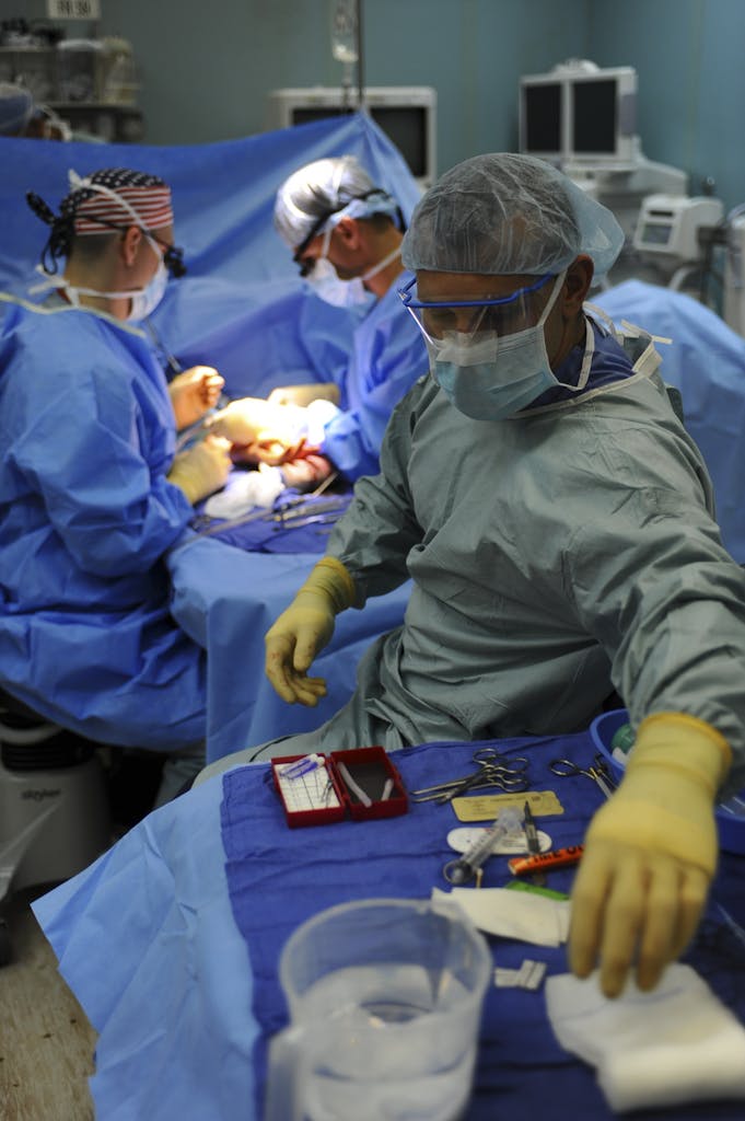 Group of Doctors in Italy Doing Operation Inside Surgical Room